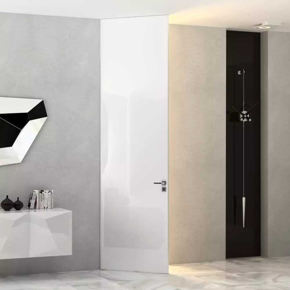 The door to the ceiling. FILO–60, glossy enamel Bianco Gloss, hidden door frame in Chrome Matt finish.