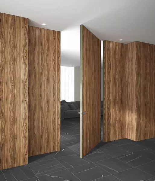COVER, natural veneer Noce Europeo. Wall panels and door PIVOT–60, Alu in single finish.